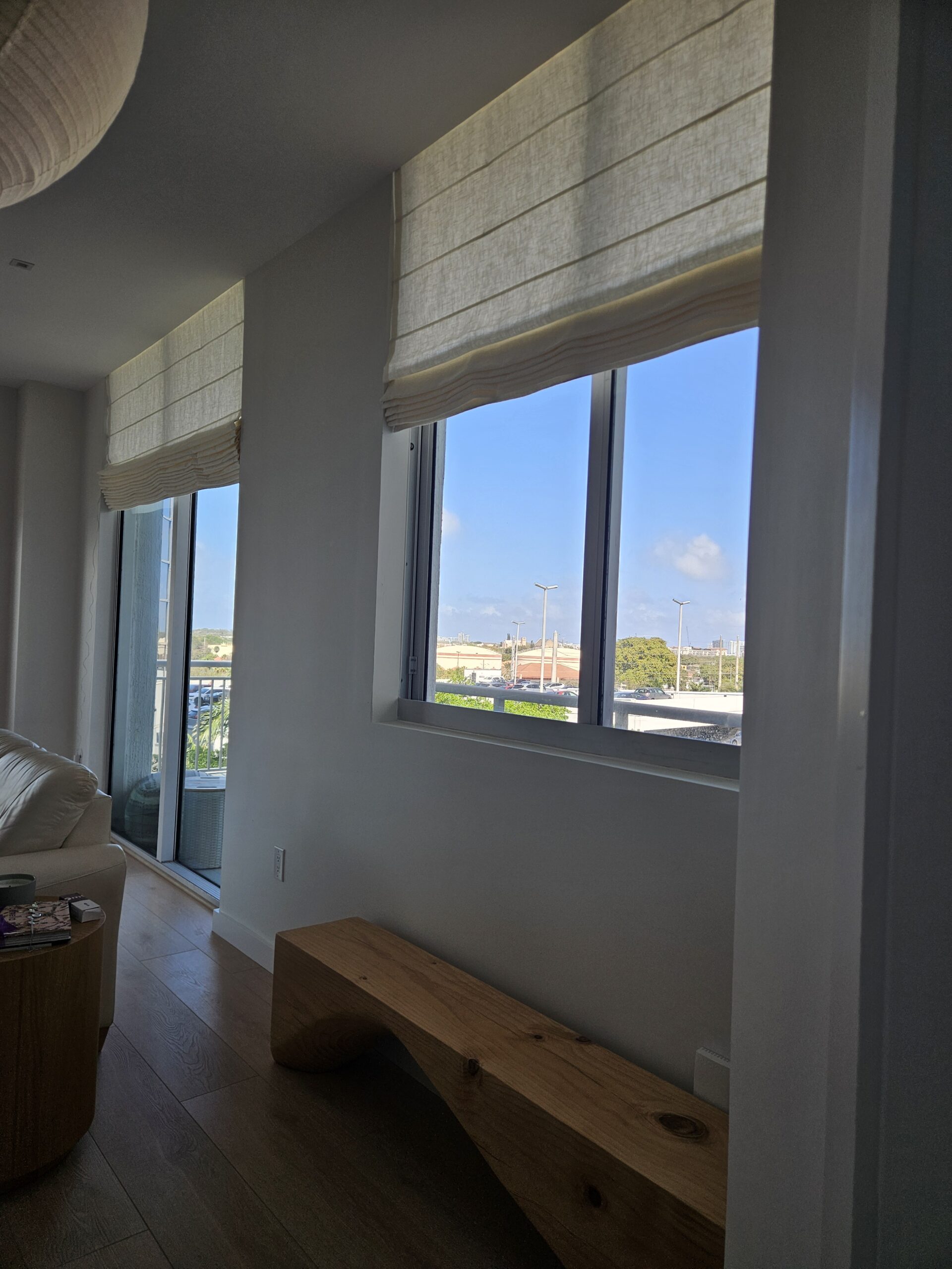 Motorized custom Roman shades installed in a Palm Beach County condo